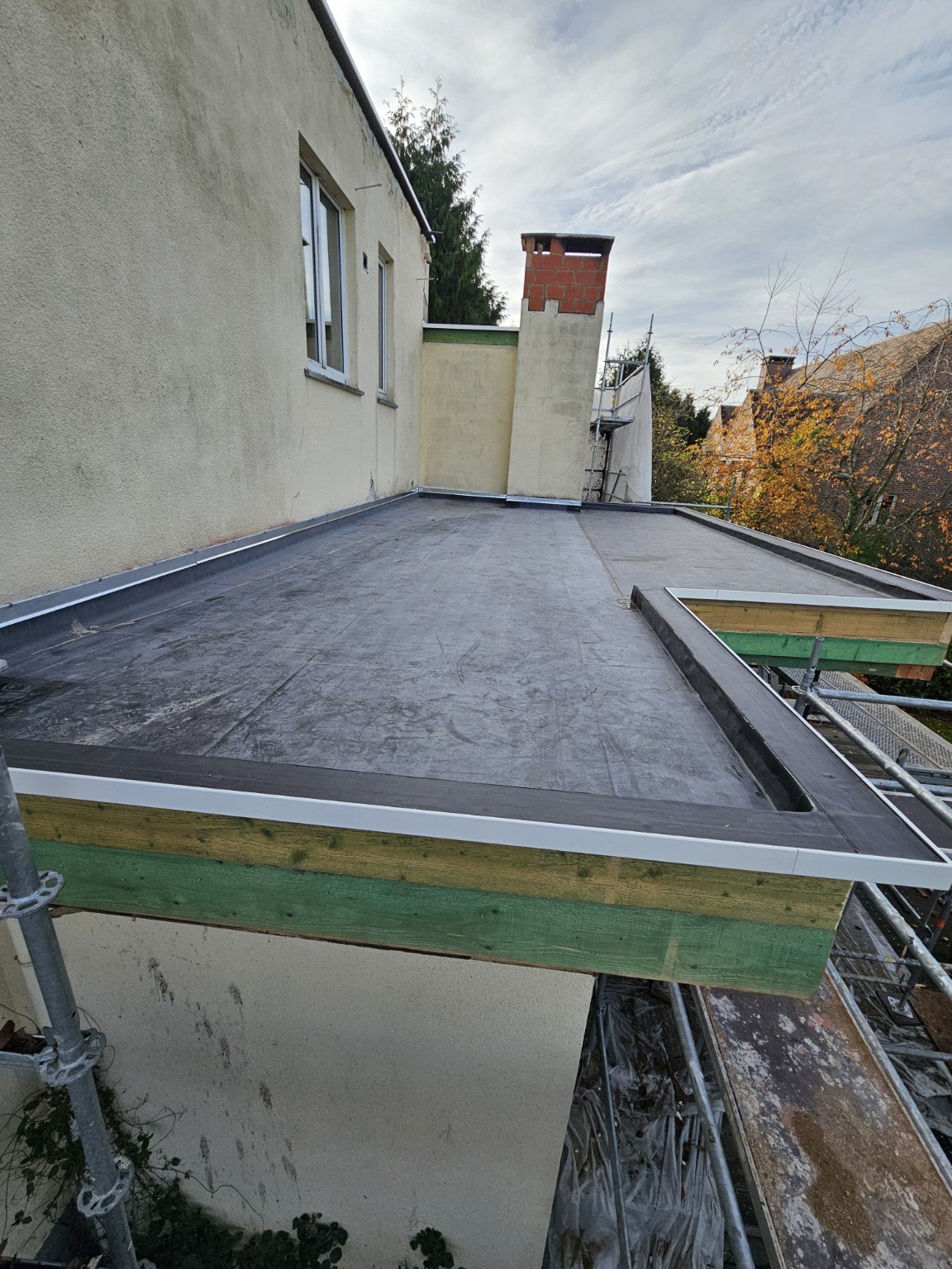 Rénovation de toiture plate à Rhode-Saint-Genèse - Étanchéité AD