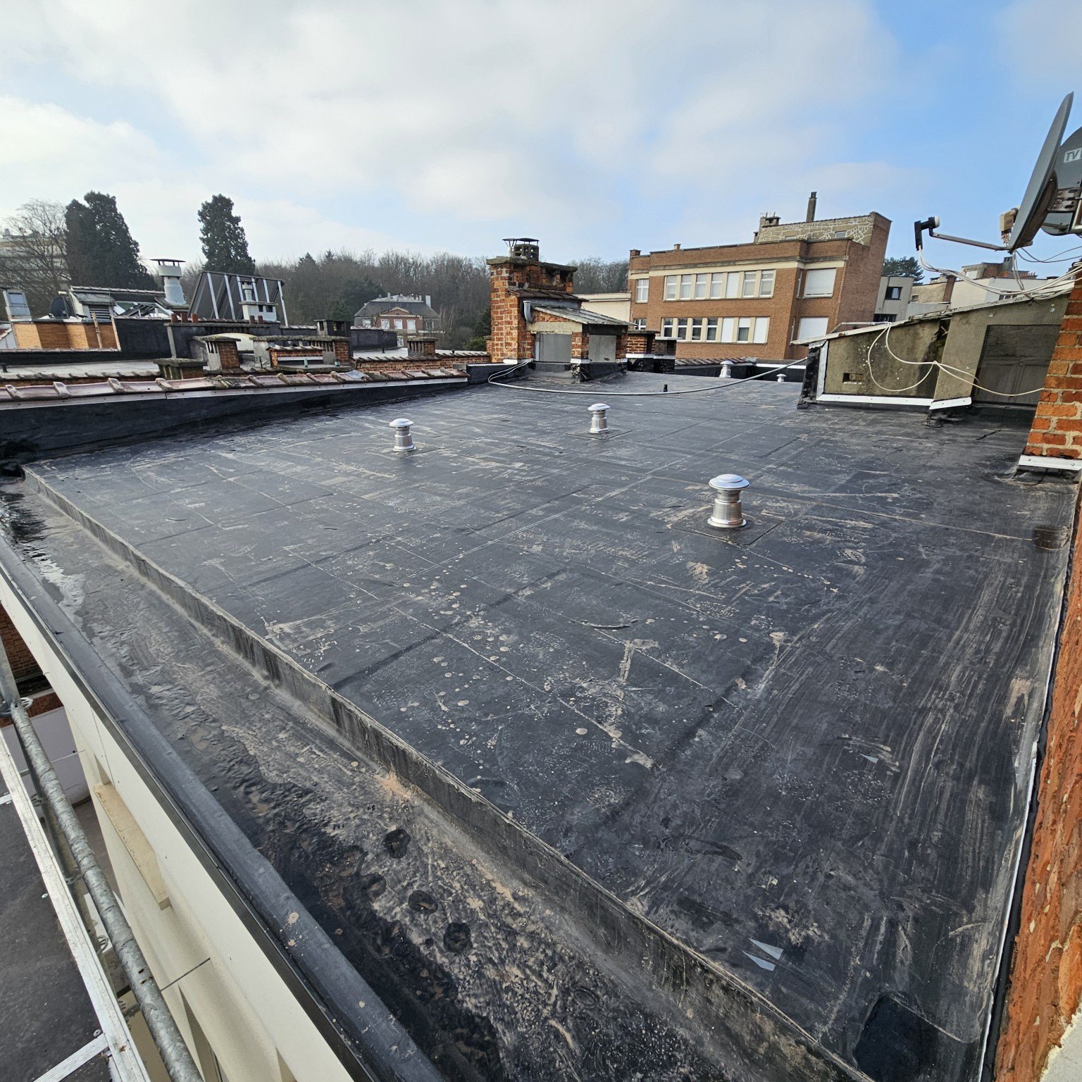Rénovation de toiture plate à Ixelles en région bruxelloise - Étanchéité AD