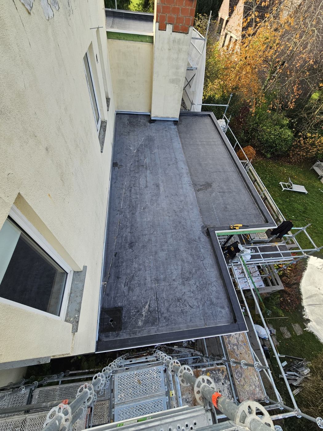 Rénovation EPDM avec calage de pente à Rhode-Saint-Genèse - photo 4